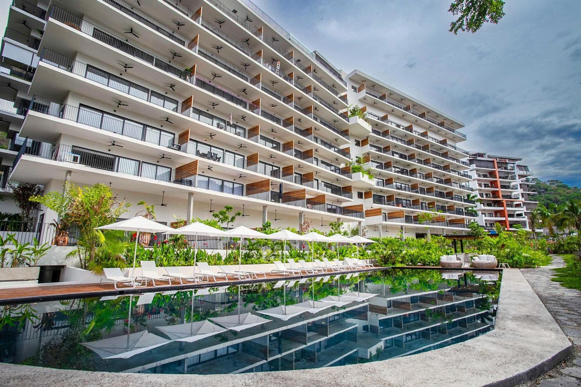 Holiday home Riverfront 3br At Oasis | 2 Pools, Gym & Bar