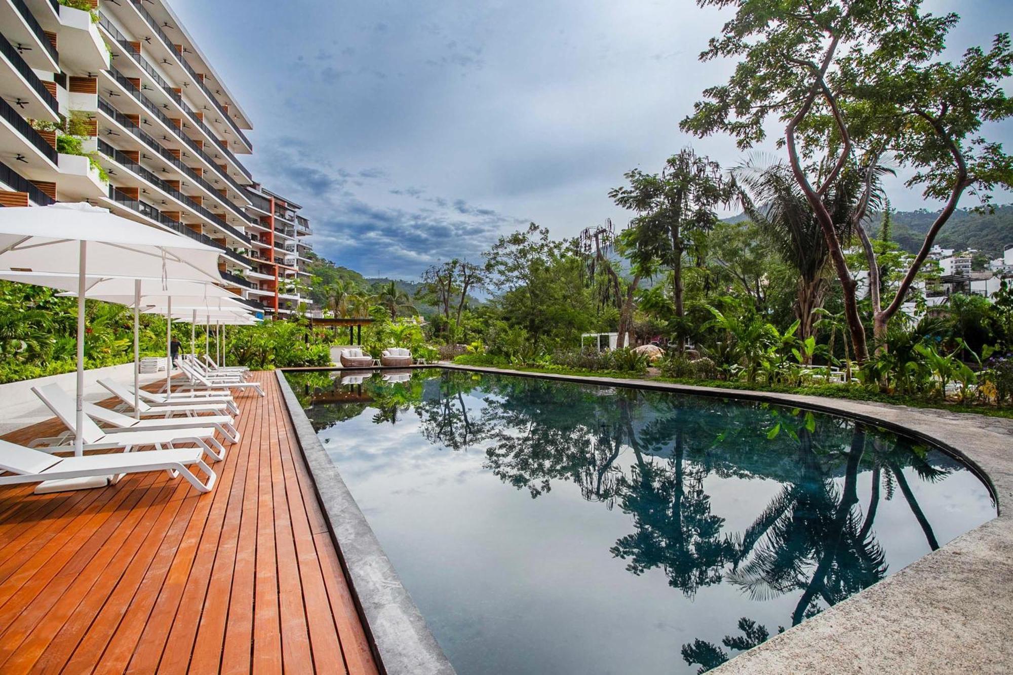 Holiday home Riverfront 3br At Oasis | 2 Pools, Gym & Bar