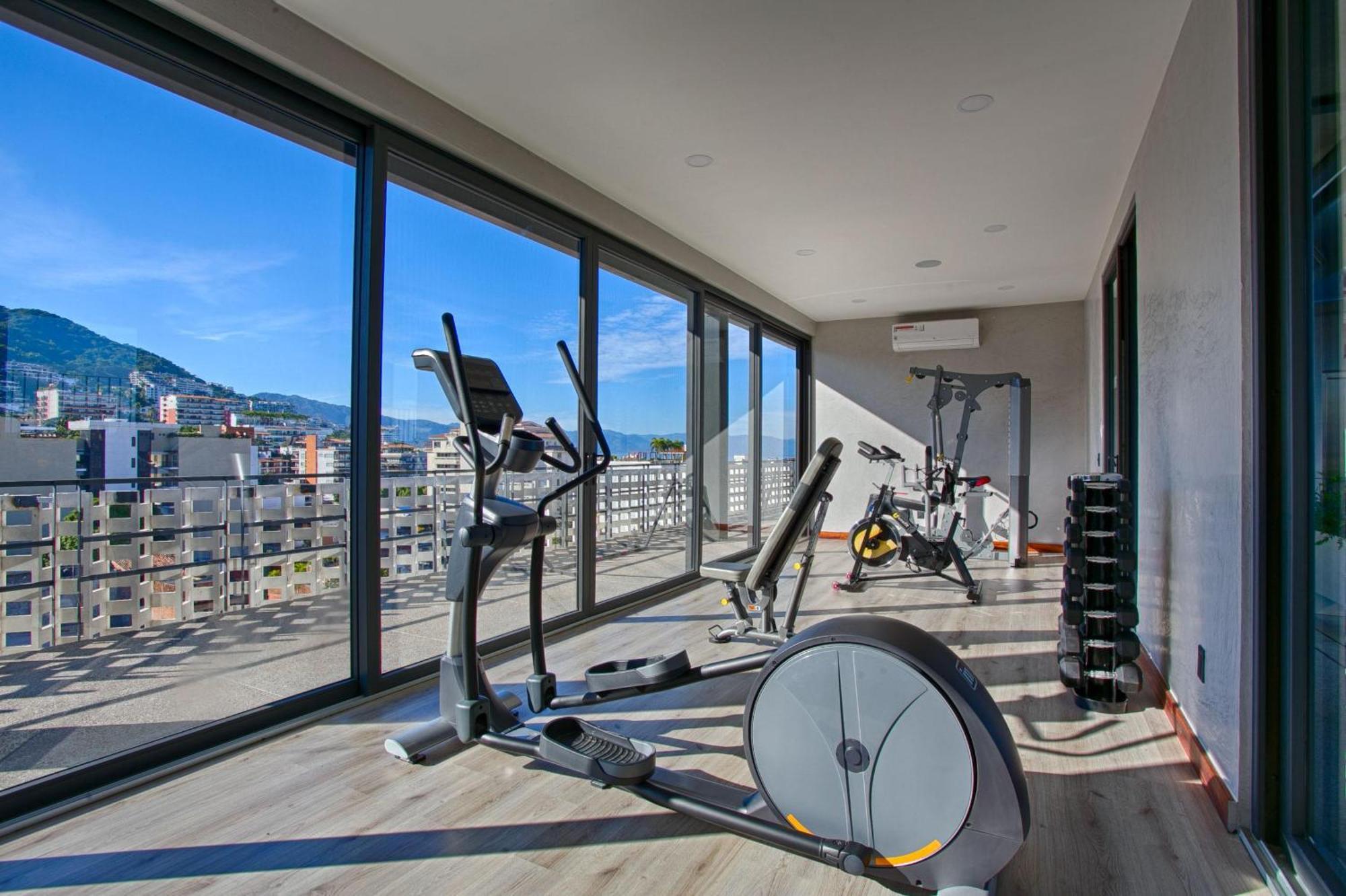 Chic, Spacious Condo, Great Walkability, Pool, Gym, Rooftop Views Holiday home Puerto Vallarta