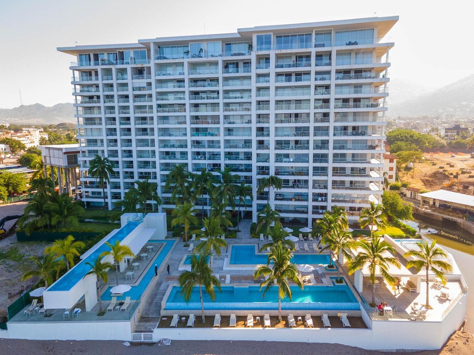 Upscale Corner Unit With Large Wrap Around Balcony And Pools * Puerto Vallarta