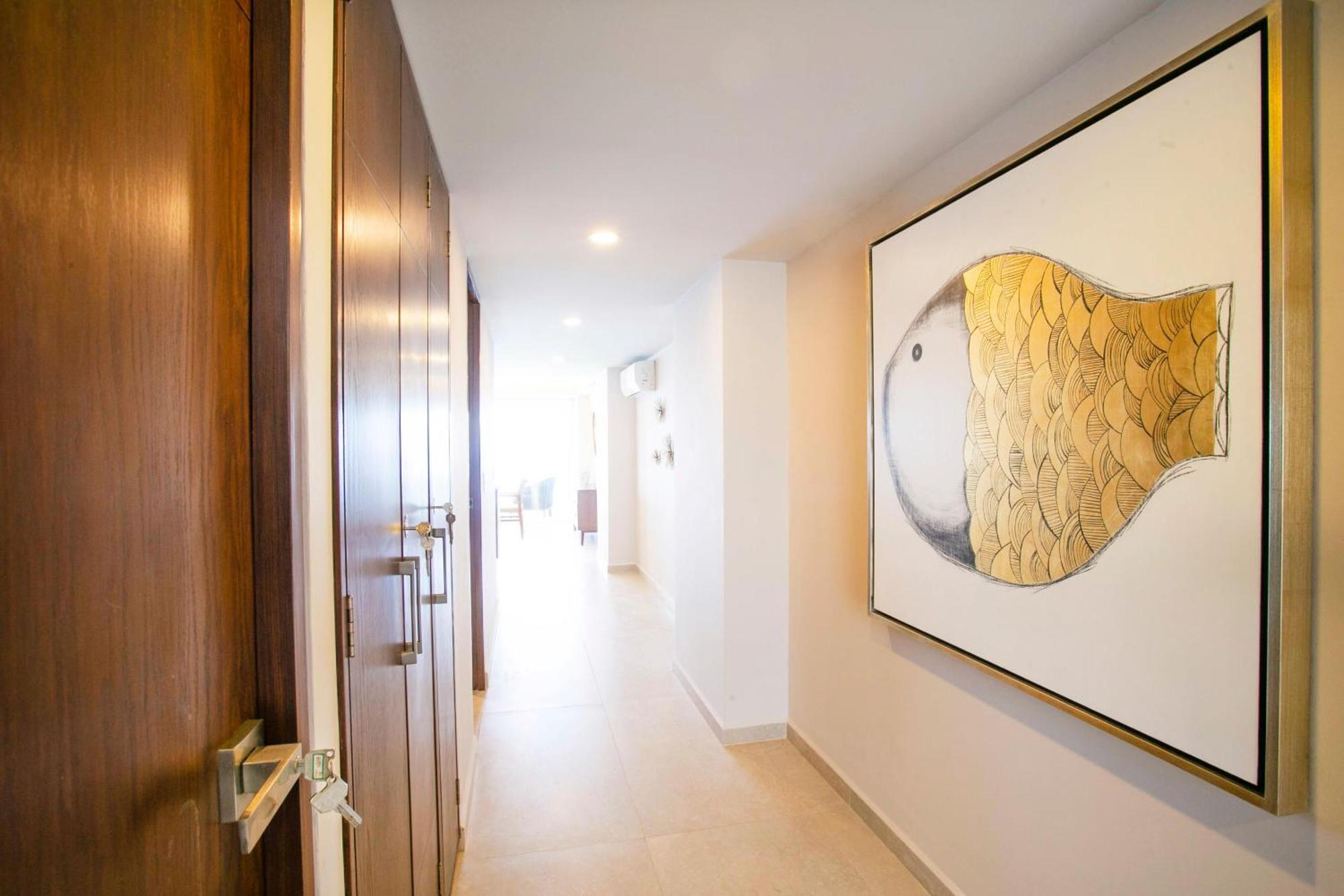 Upscale Corner Unit With Large Wrap Around Balcony And Pools